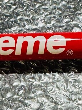 Supreme portable mini bicycle pump made by Lezyne.